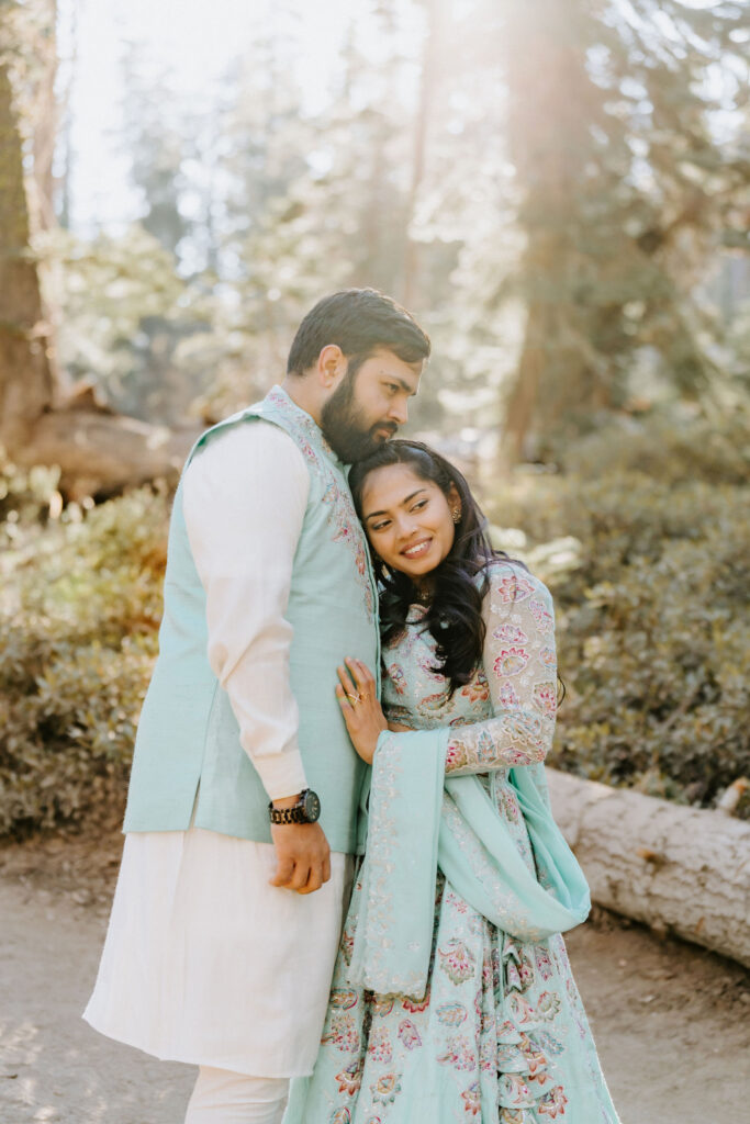 eloping couple hiking to taft point in Yosemite