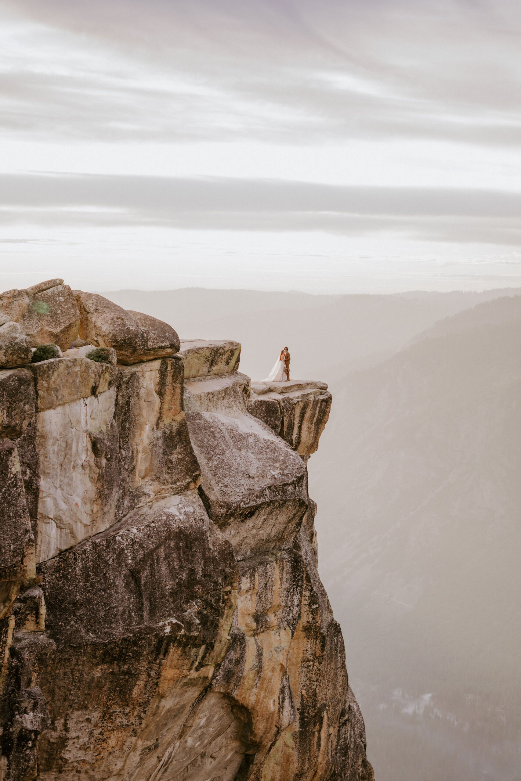 cute picture of the bride and groom at their timeless portraits