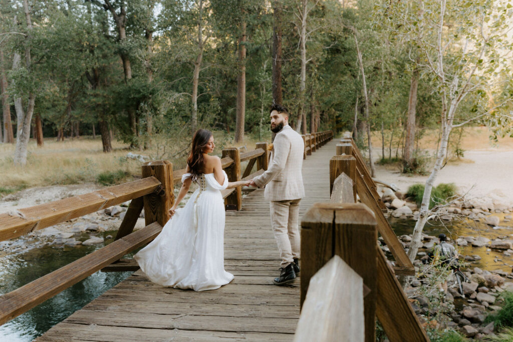 Cute picture of the bride and groom holding hands