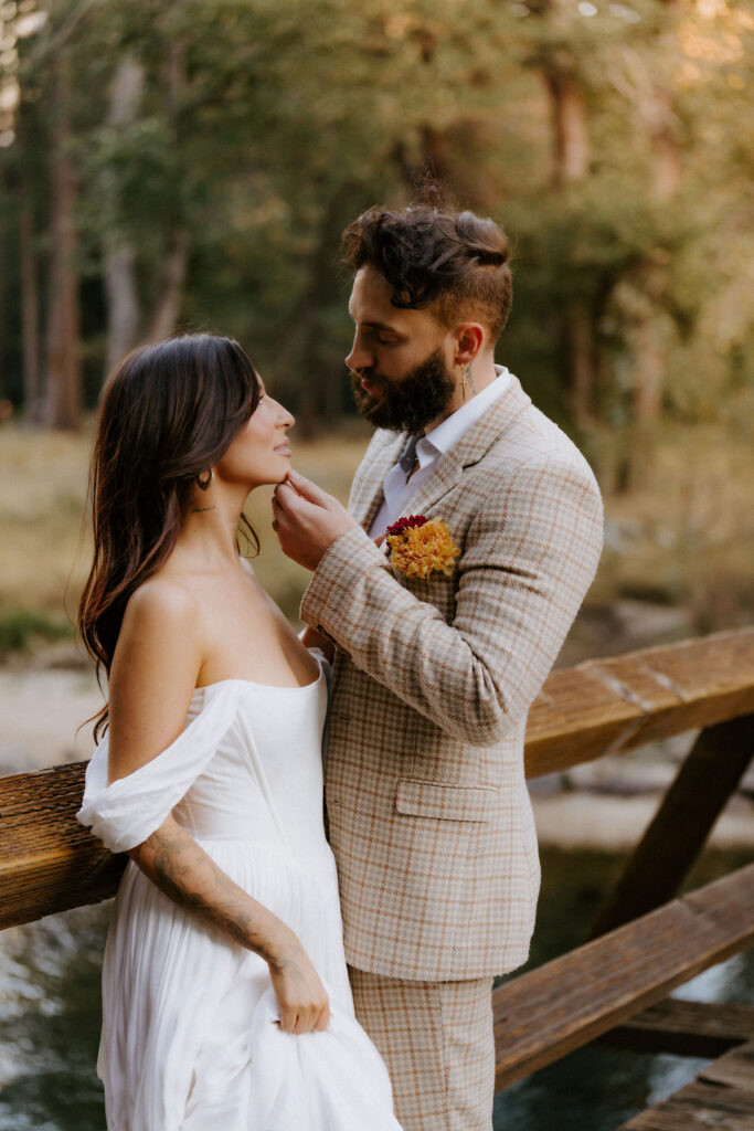 Picture of the bride and groom, smiling at each other