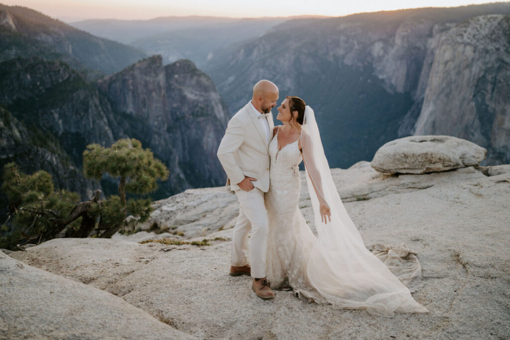 portrait of the bride and groom smiling at each other