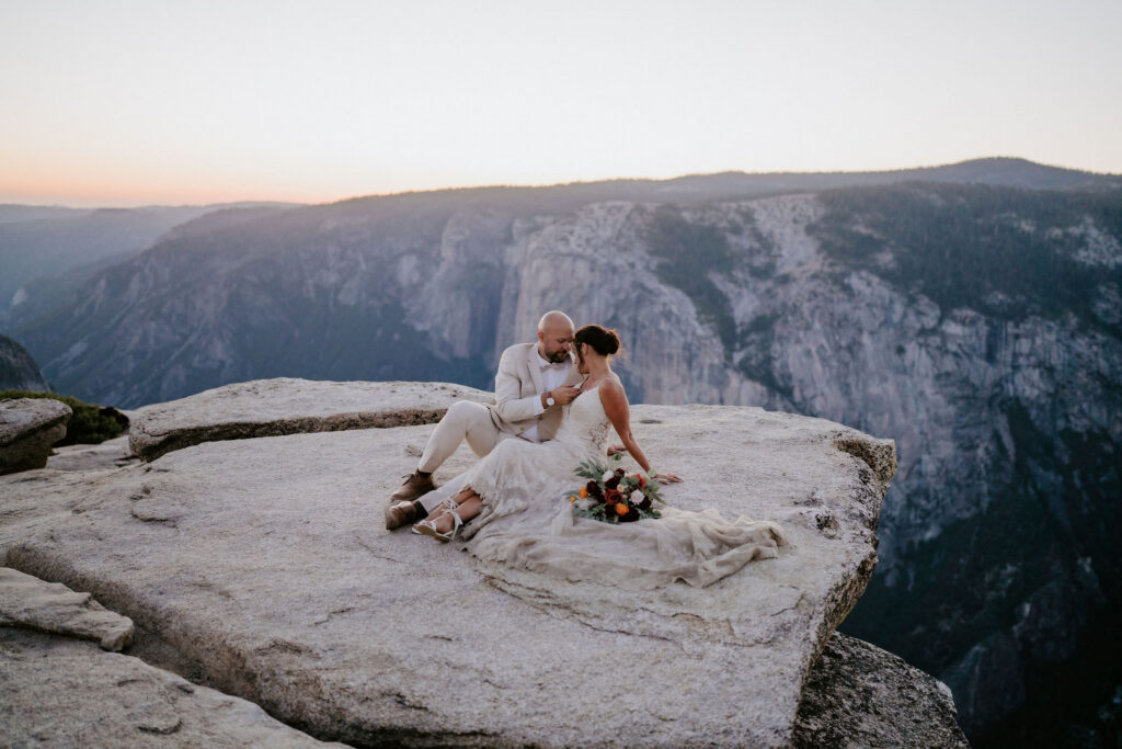 picture of the groom kissing the bride on the cheek