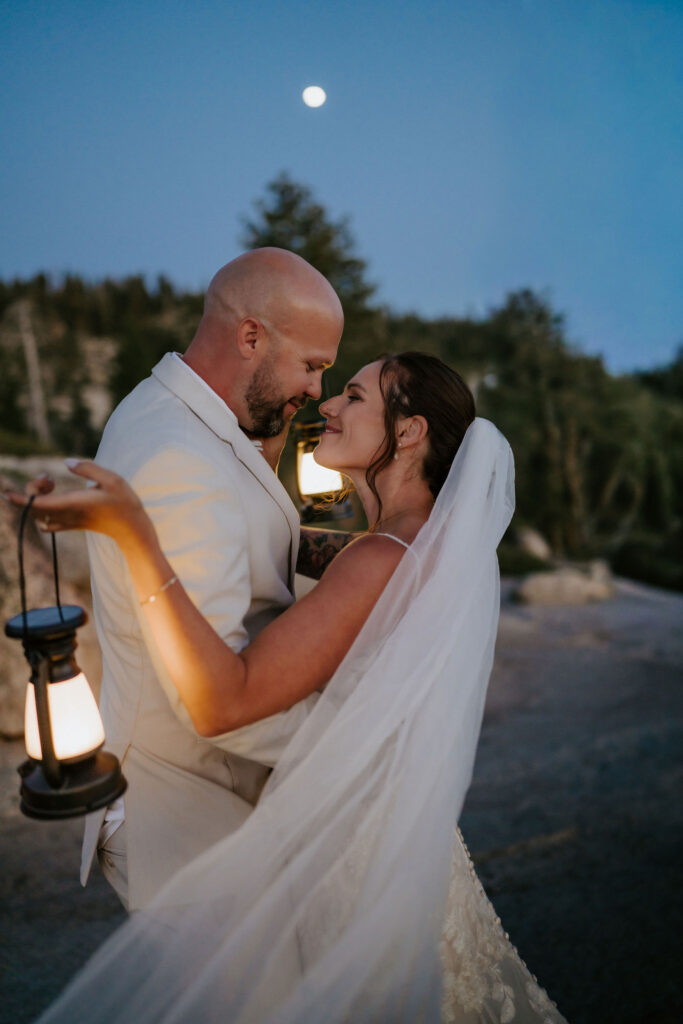portrait of the bride and groom smiling at each other