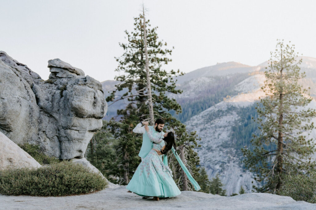 eloping couple dancing at sunrise in yosemite