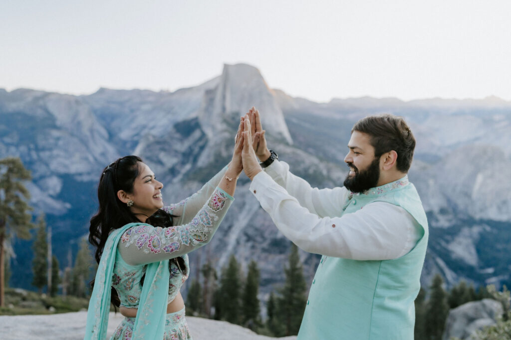 yosemite couple playing with hands