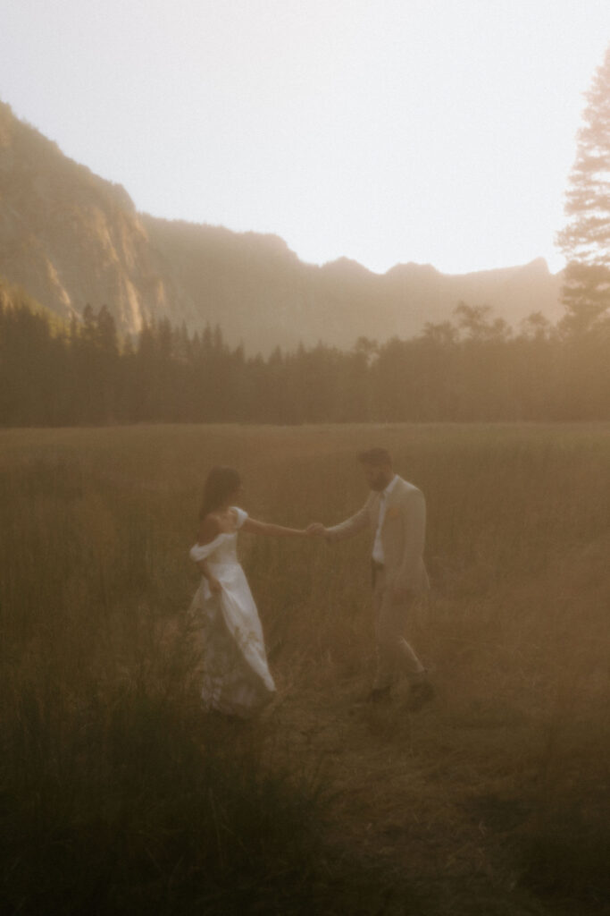 Bride and groom holding hands during their ceremony