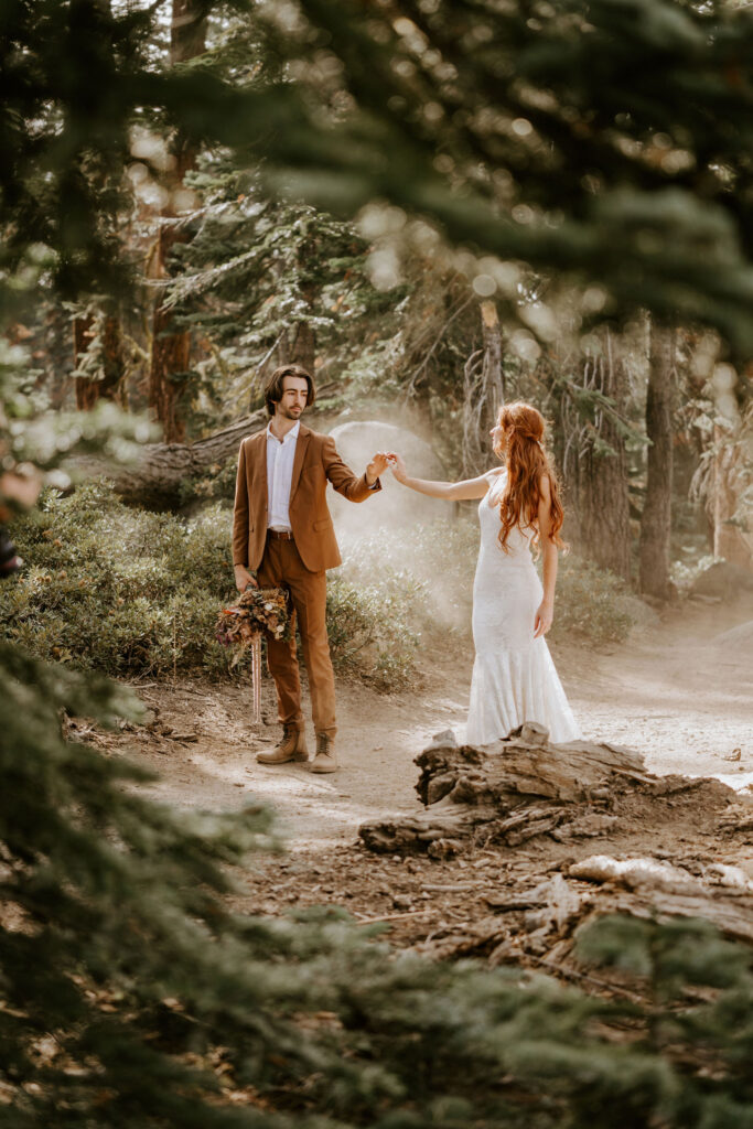 eloping couple hiking to Taft Point in Yosemite