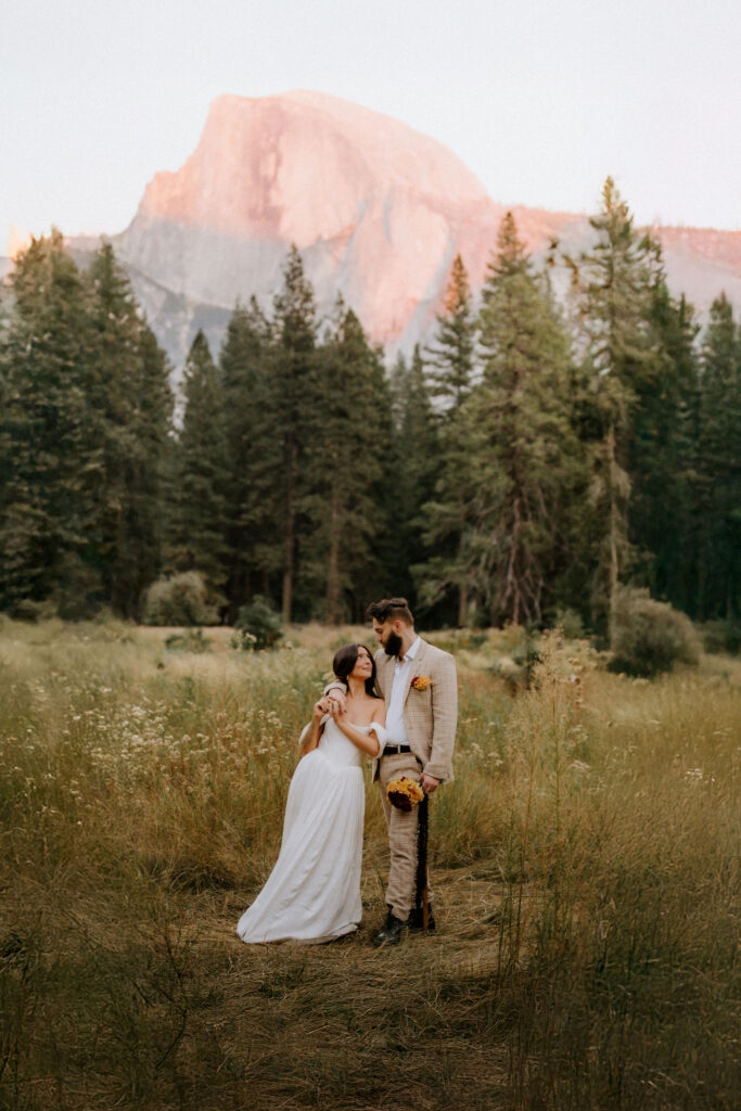 Picture of a bride and groom, smiling at each other