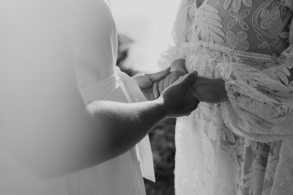 black and white couple holding hands