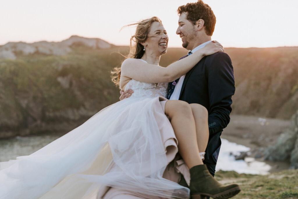 couple at sunset on california coast