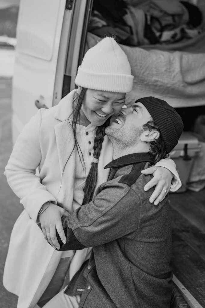 black and white close up of couple kissing during Lake Tahoe proposal