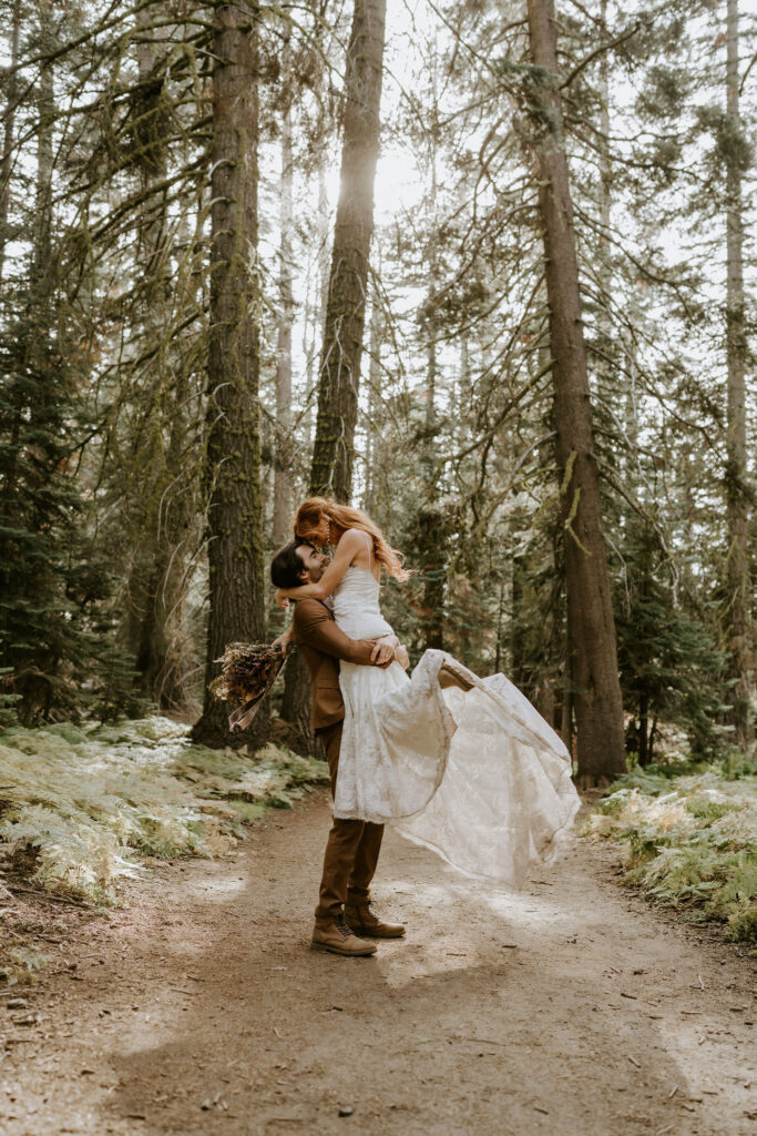 Eloping couple enjoying the hike to Taft Point