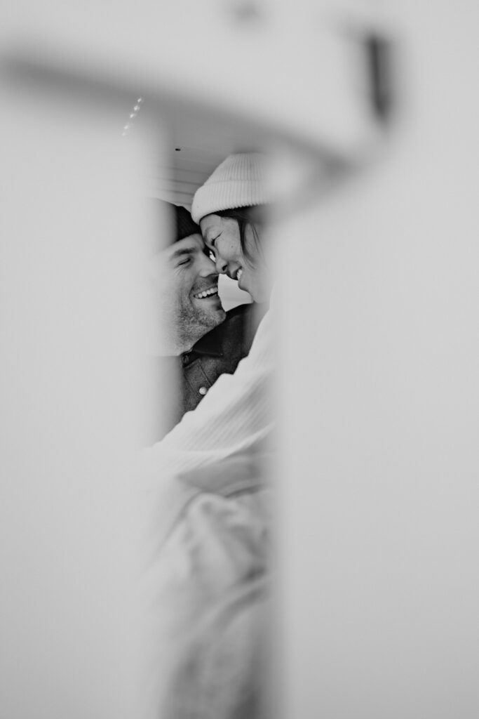 black and white of couple during Lake Tahoe proposal