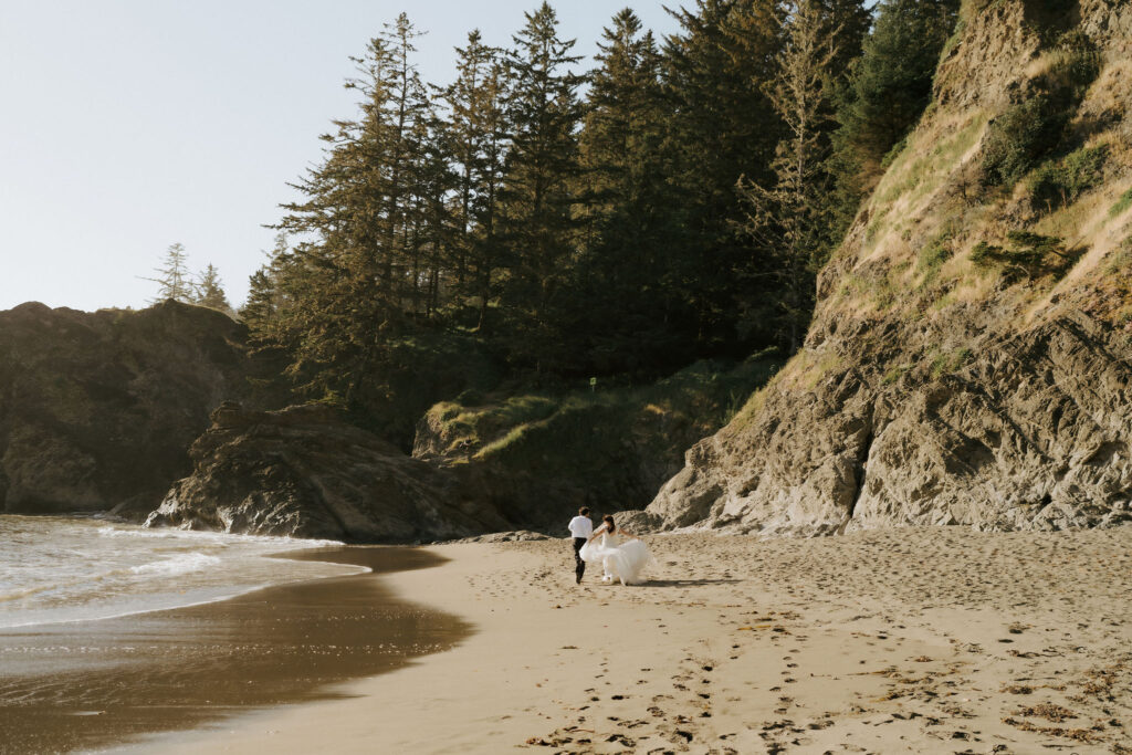 couple running on beach