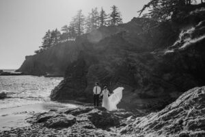 black and white eloping couple on beach