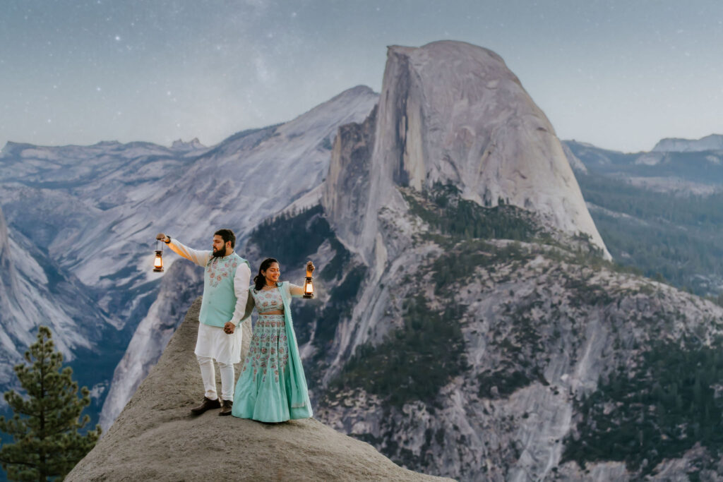 eloping couple at sunrise taking star photos at glacier point in yosemite