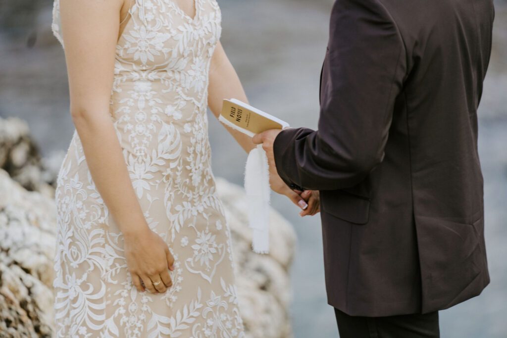 close up of couple vow books