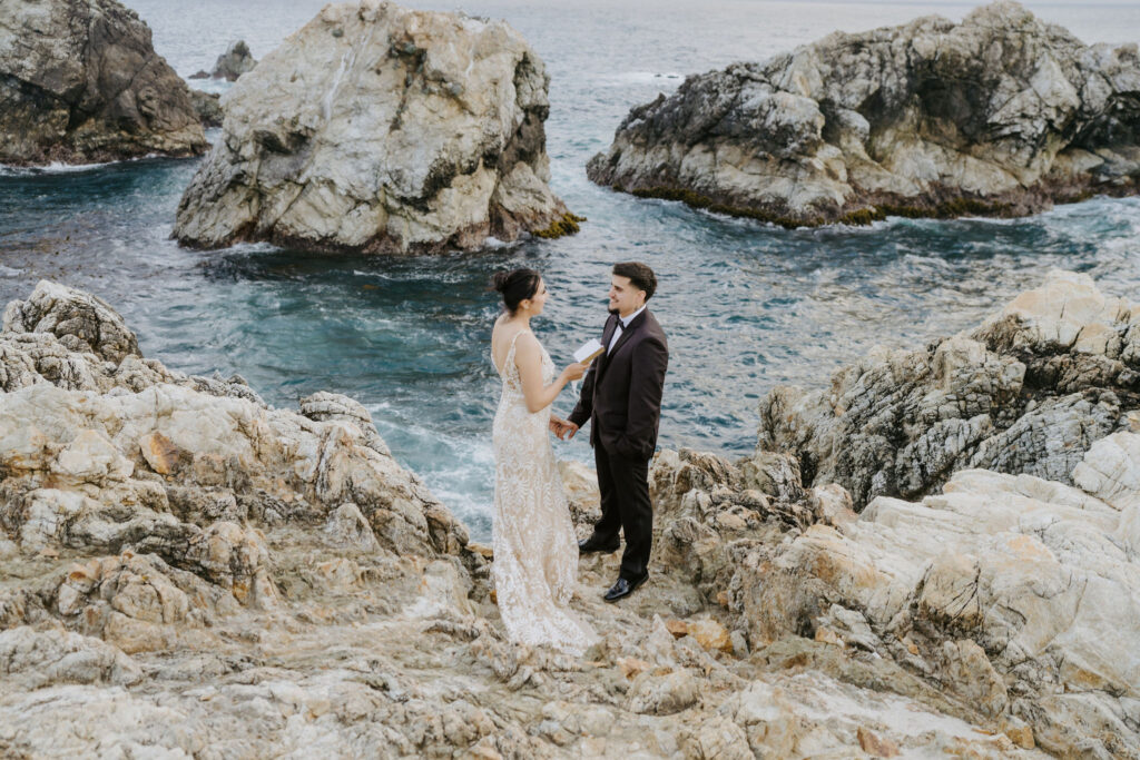 couple exchanging private vows on big sur coastline