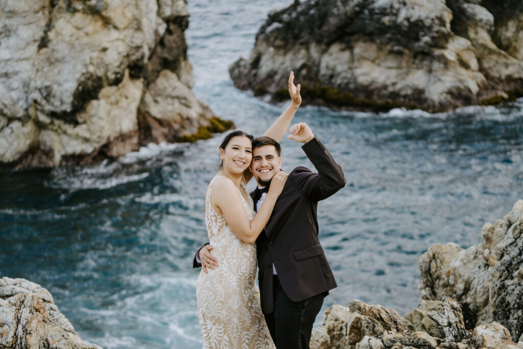 coupe cheering after wedding ceremony in big sur