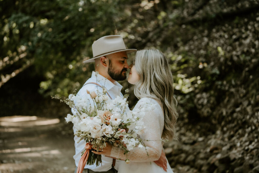 eloping couple posing for portraits in the California Redwood Forest