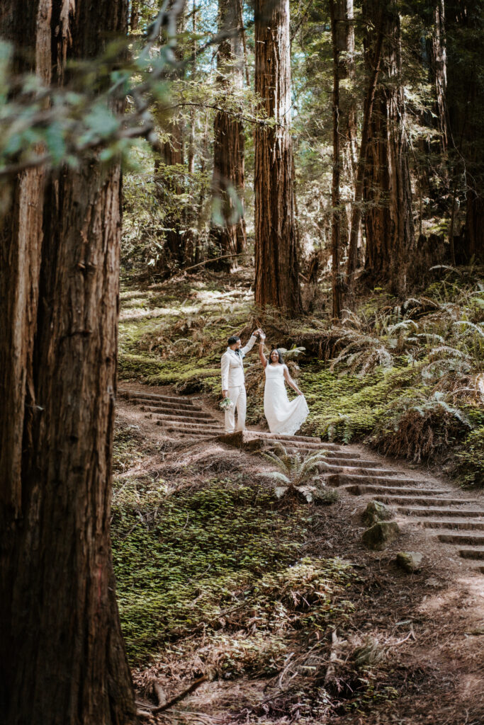 Muir woods eloping couple dancing in the trees