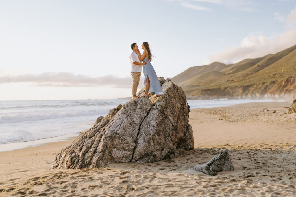 eloping couple on rock in big sur