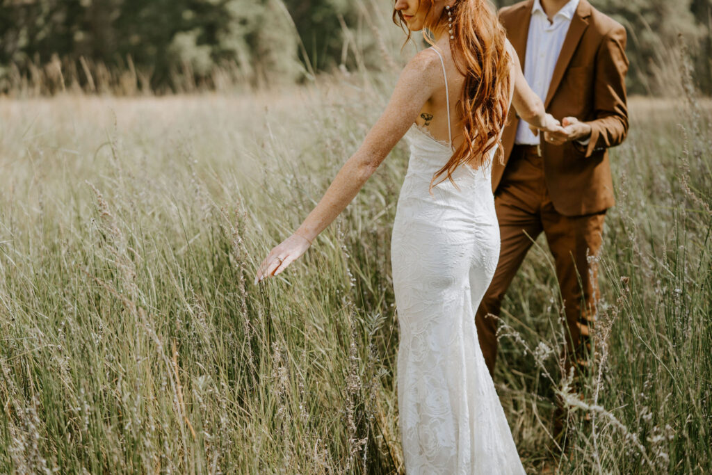 couple walking in El Capitan Meadow in Yosemite