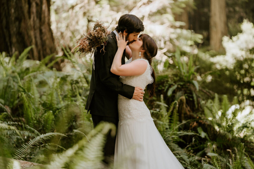 bride and groom kiss