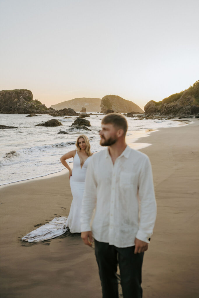 bride and groom standing portaits during Oregon Coast sunset elopement on the beach