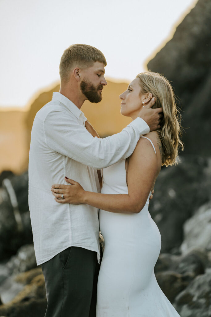 close up of bride and groom before first kiss during oregon coast sunset elopement