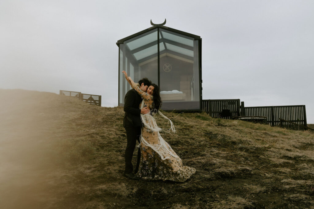 panorama glass house eloping couple in iceland