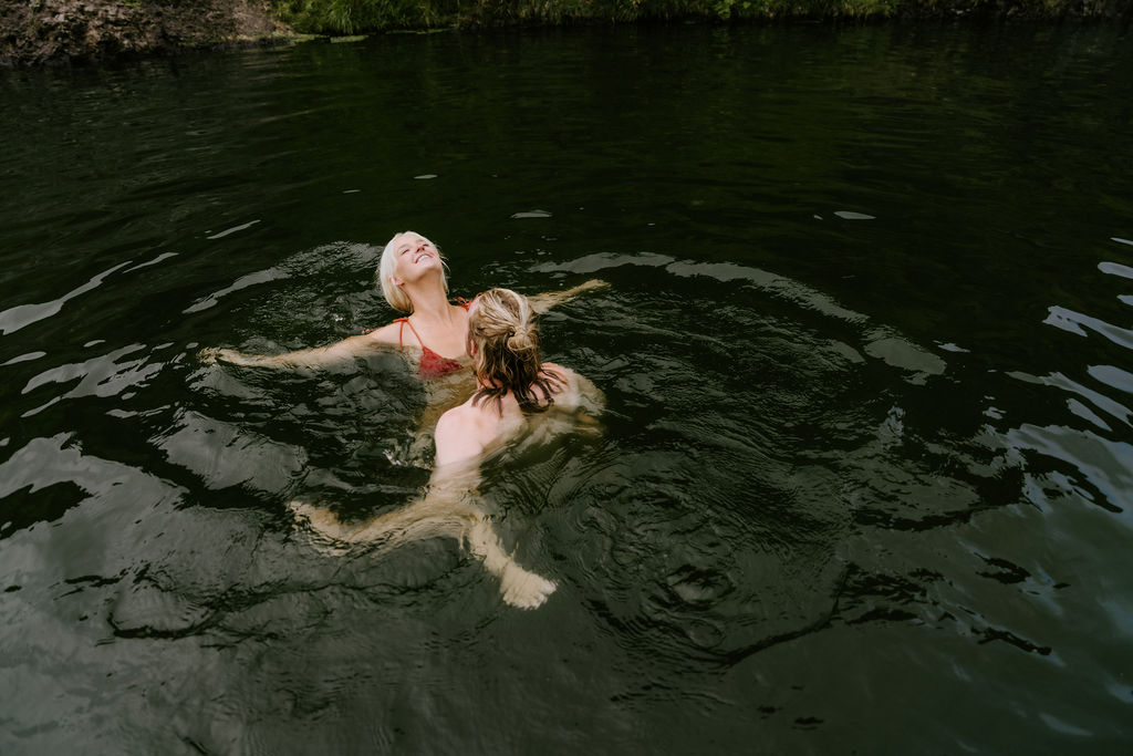 couple enjoying the water at Seljavallalaug