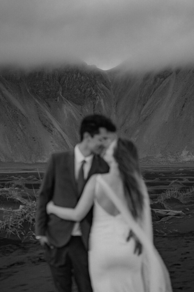 black and white detail of wedding couple at Stokksnes