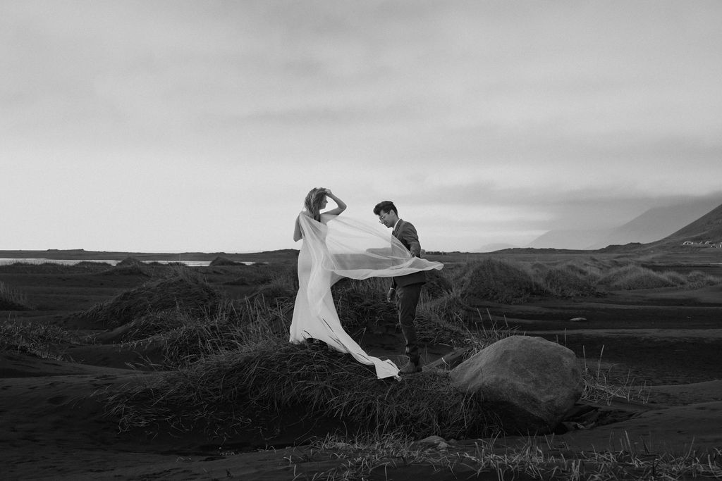 Stokksnes in black and white with couple eloping