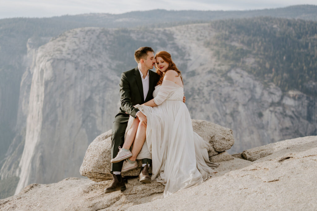 eloping couple taking in the Yosemite views on wedding day