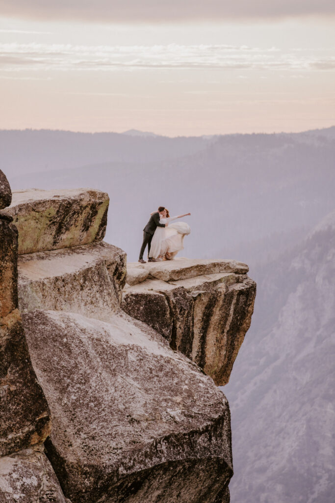 adventure elopement couple at Taft Point at Sunset