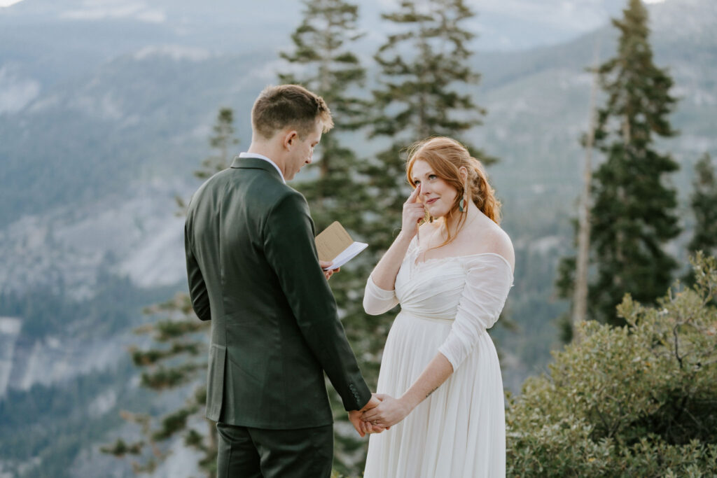 eloping couple exchanging vows in Yosemite