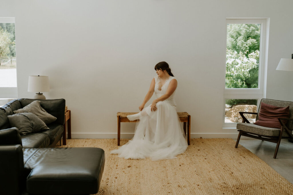 bride getting ready in an airbnb