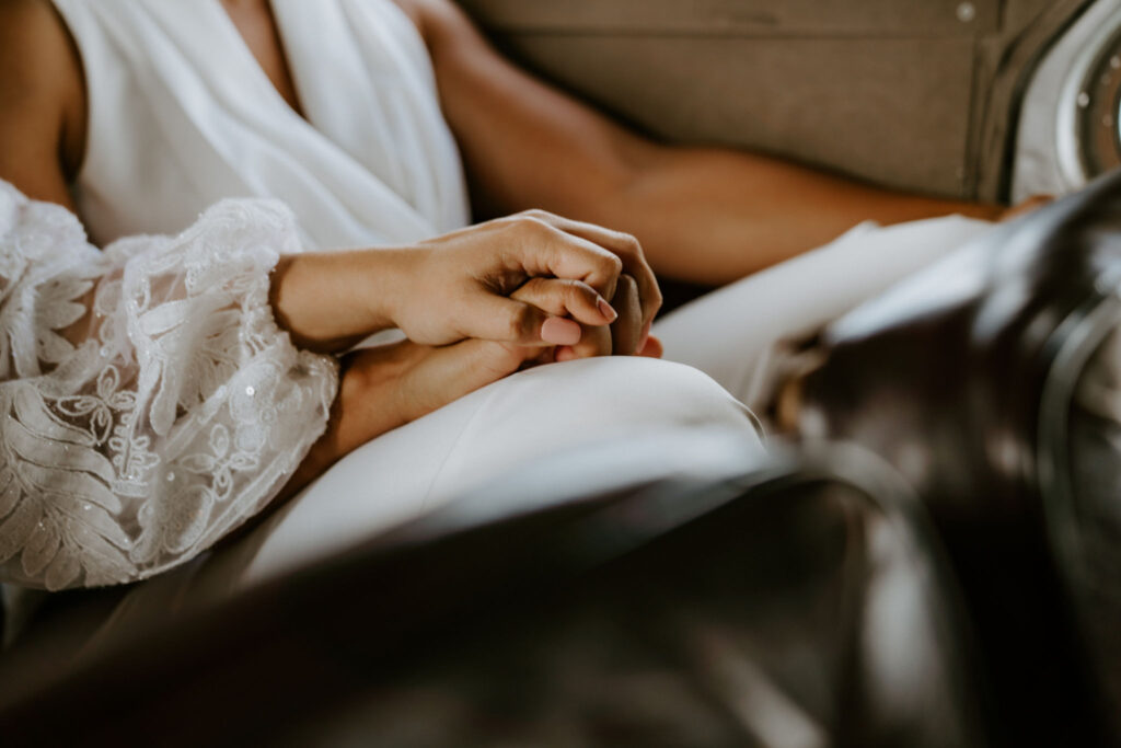 lgbtq elopement couple in a helicopter