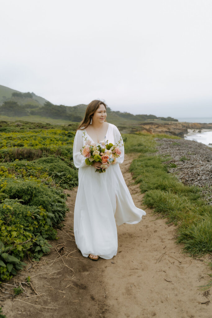 bride walking towards the groom for their ceremony