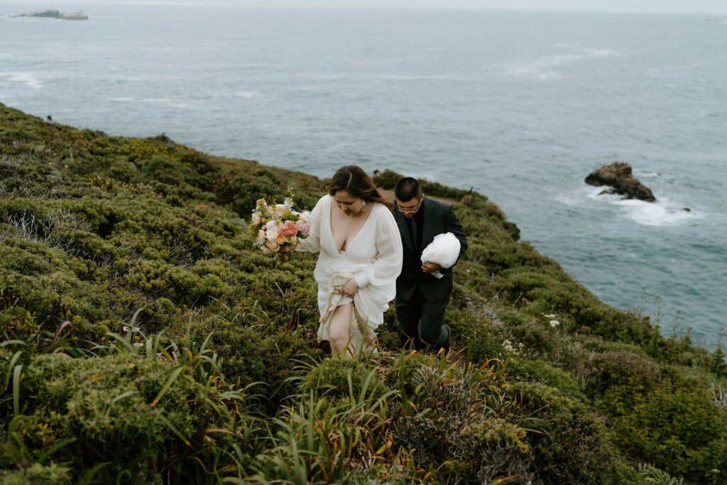 bride and groom hiking at Soberanes Point
