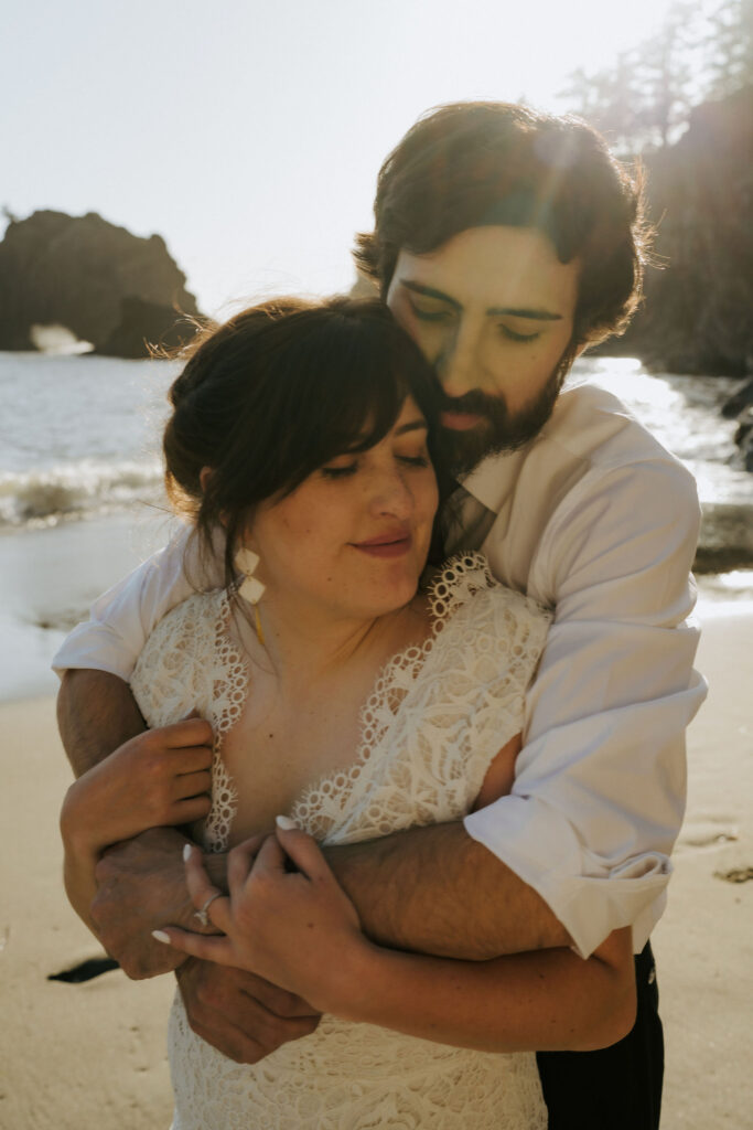 intimate bride and groom hugging moment 
