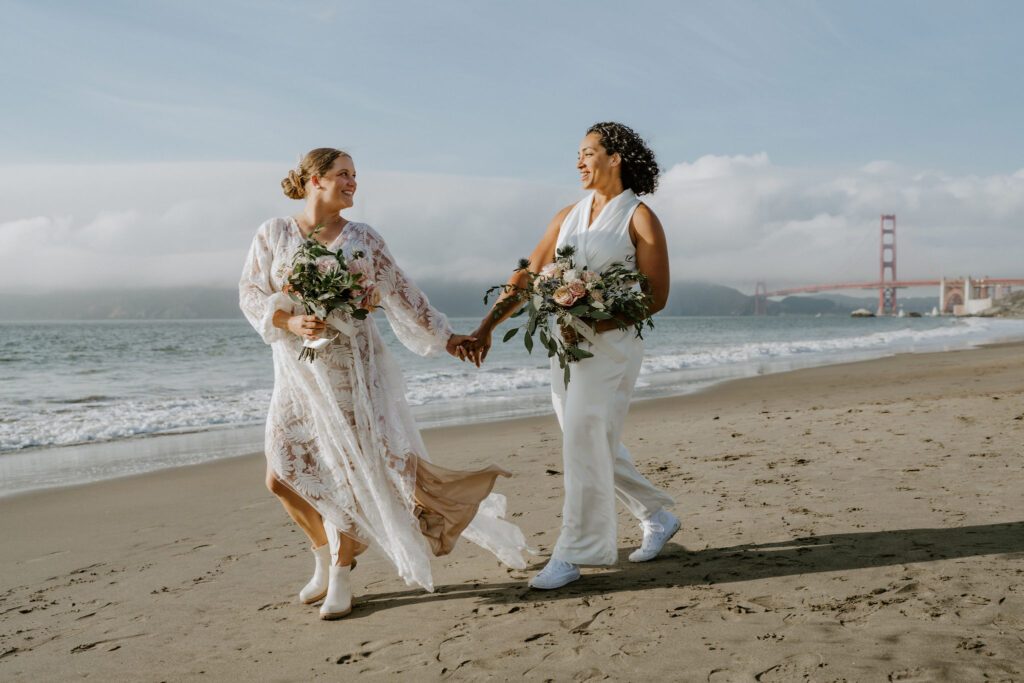 lgbtq elopement couple at the San Francisco beach shore
