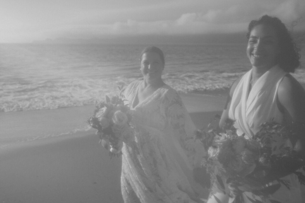 elopement couple walking along the shore during their beach elopement in California