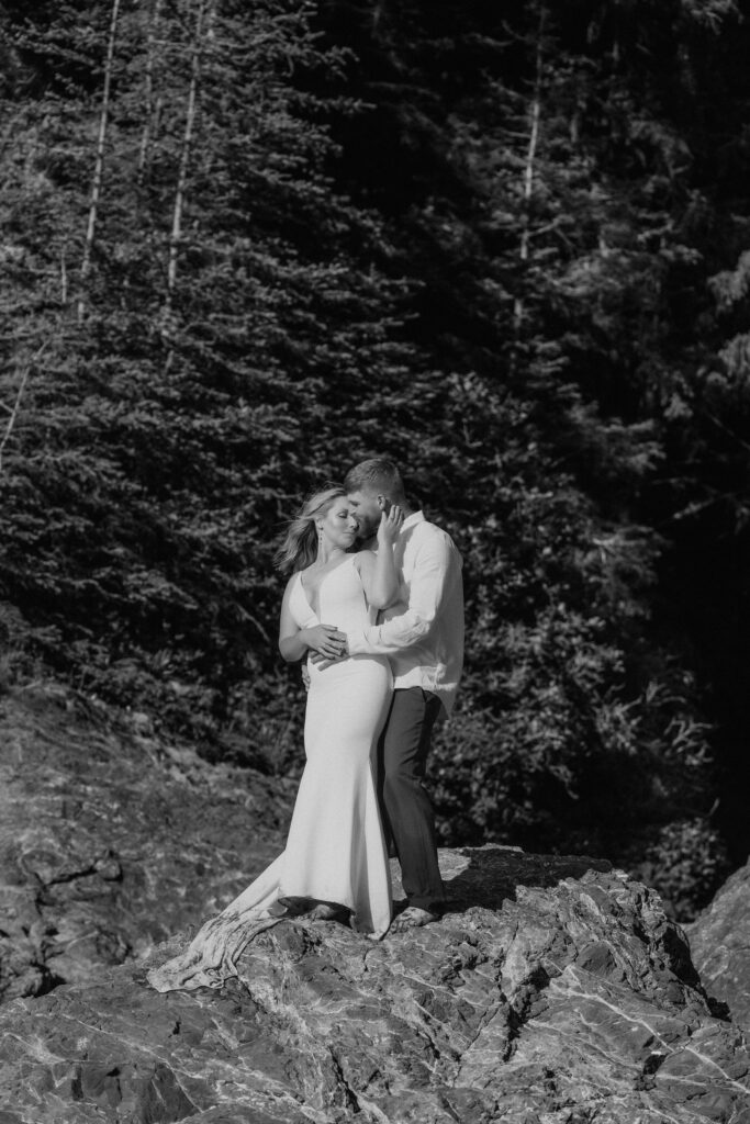 intimate bride and groom hugging moment during their beach elopement in California