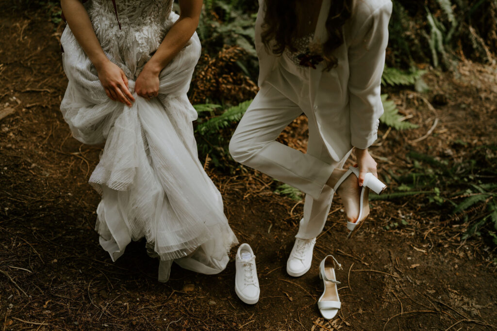 brides changing shoes for comfier hiking