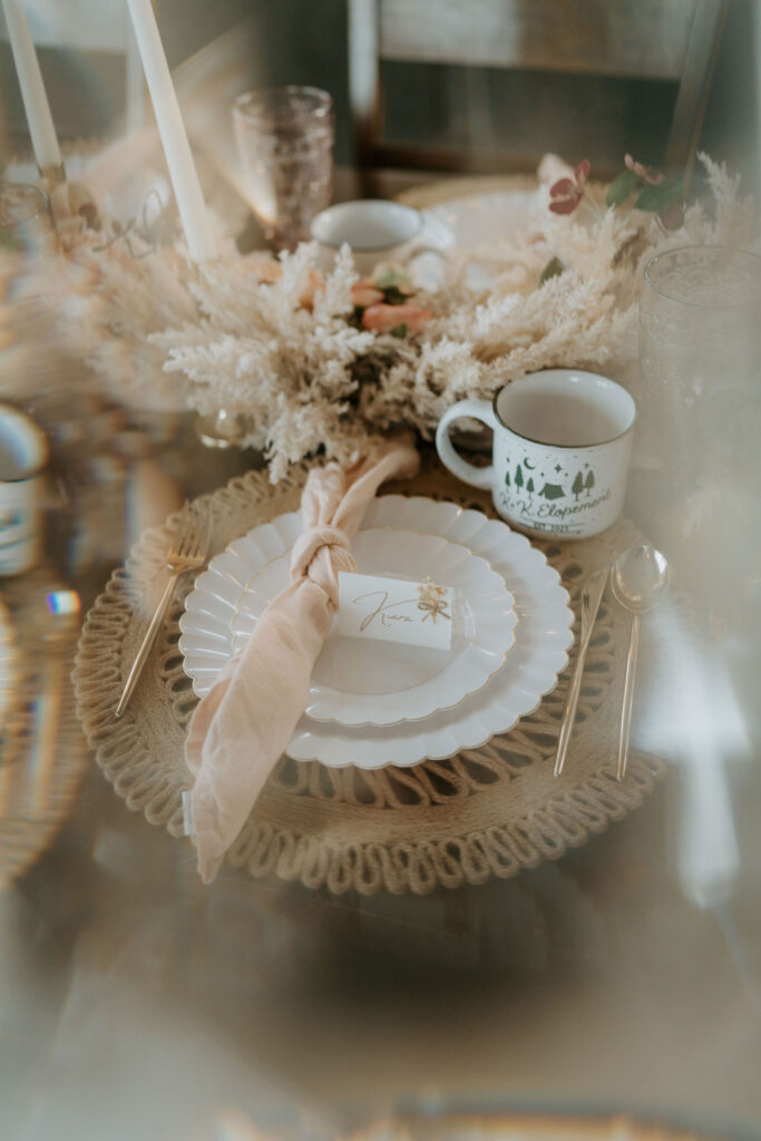 small reception table decorated with boho colors and florals for an intimate lunch with family