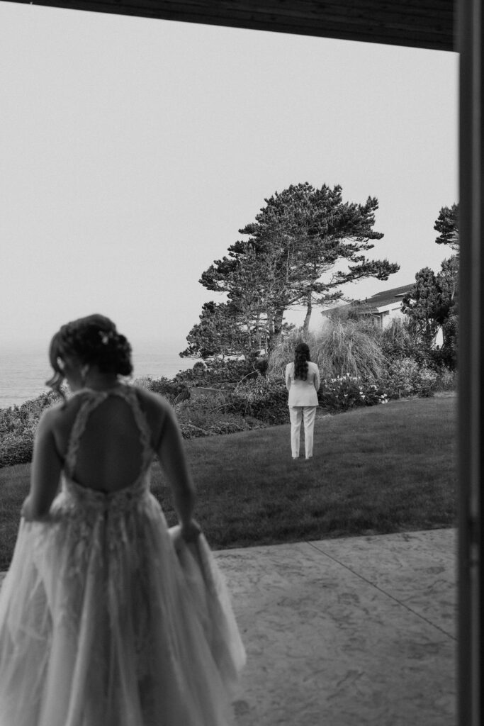 emotional and candid first look moments overlooking the ocean