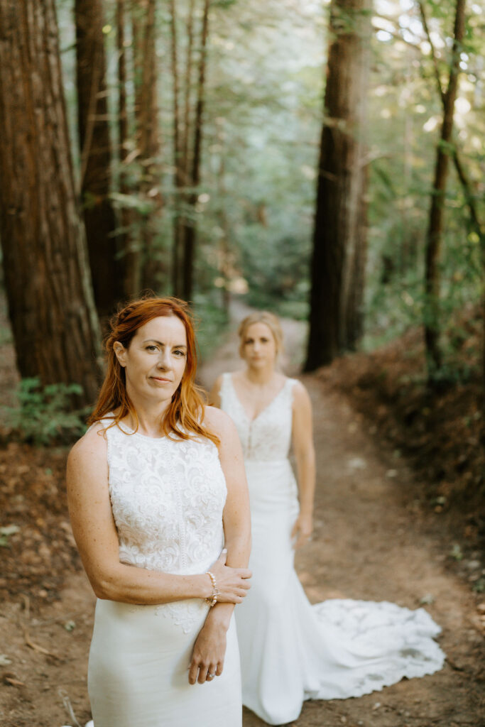 brides hiking through pfeiffer redwood state park