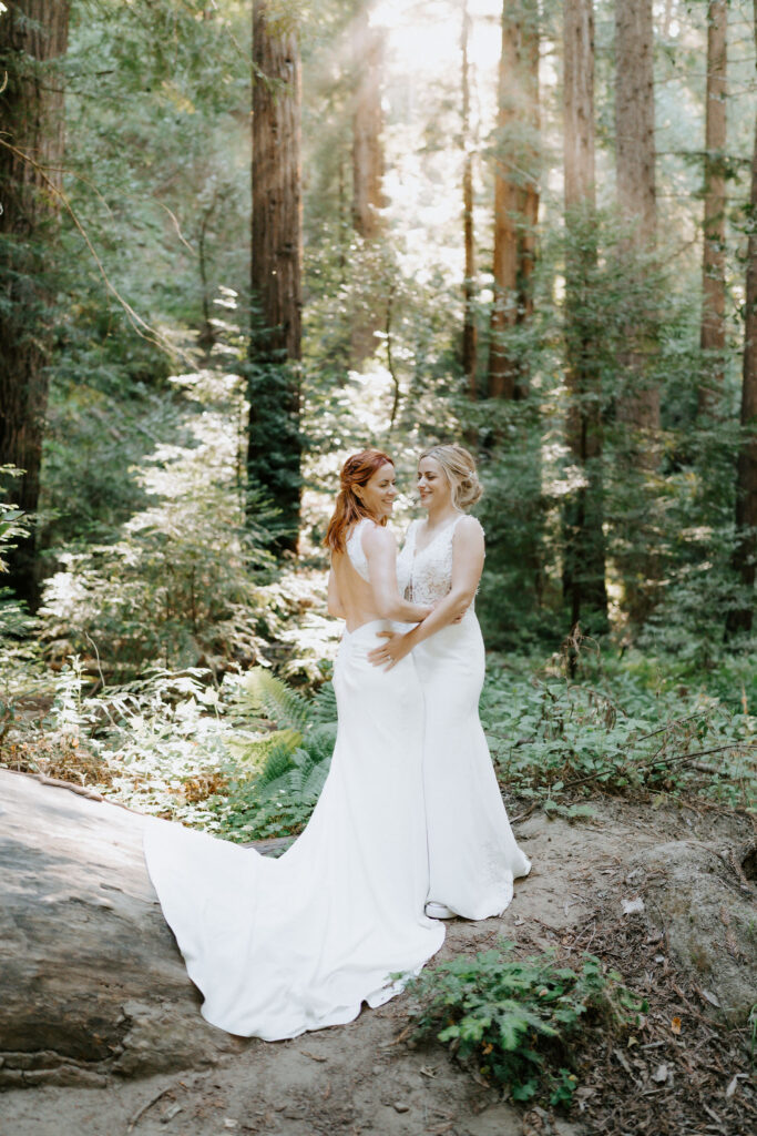 romantic moments of brides surrounded by lush redwood trees at pfeiffer redwood state park